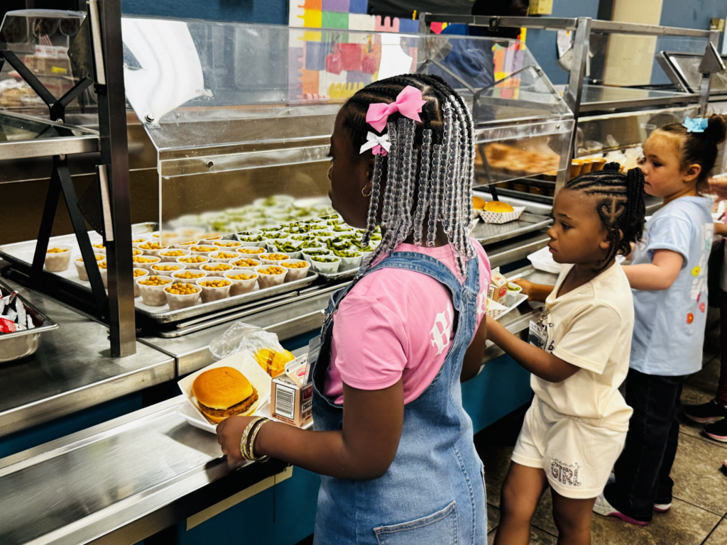 students in line getting lunch