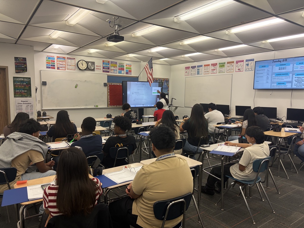 Class of students learning in class