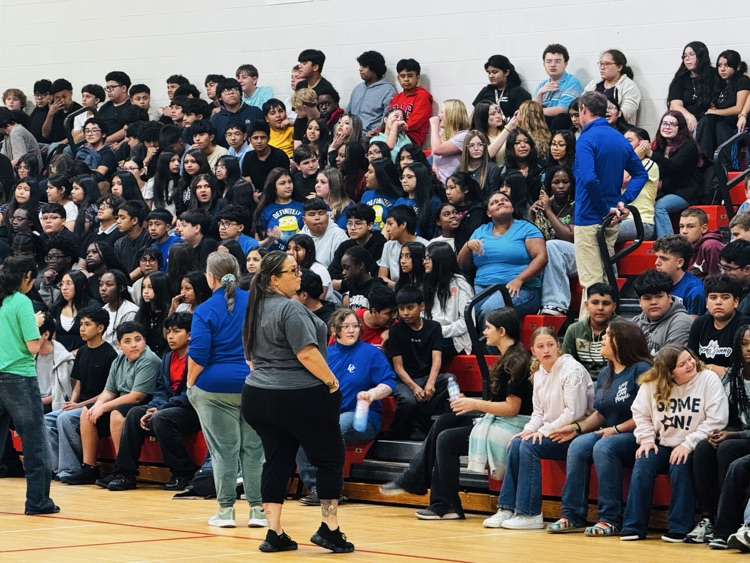 kids sitting at a pep rally