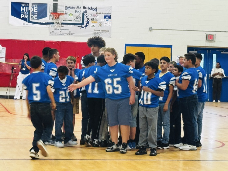 football team in the basketball court