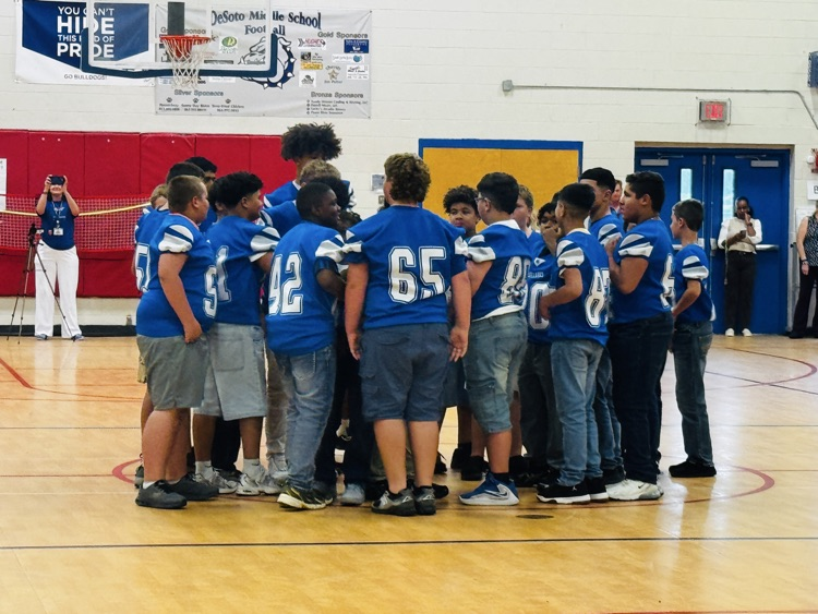 football team on the basketball court
