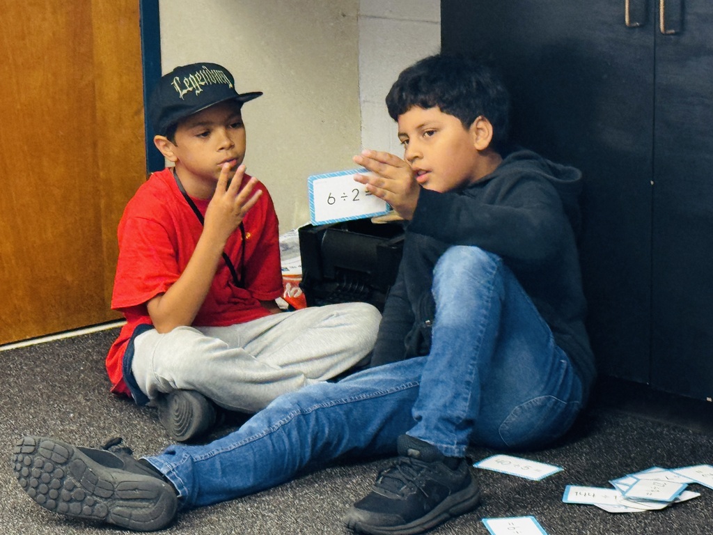 two students working on math