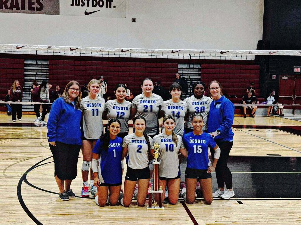 photo of JV volleyball team with coaches
