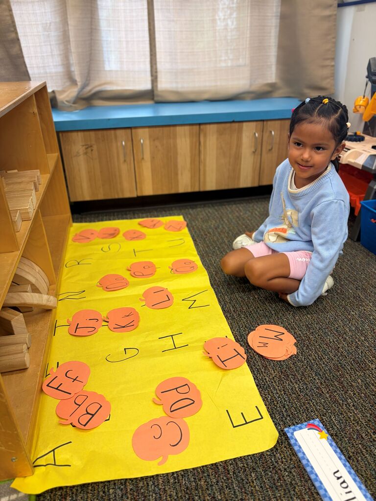student doing alphabet activity 