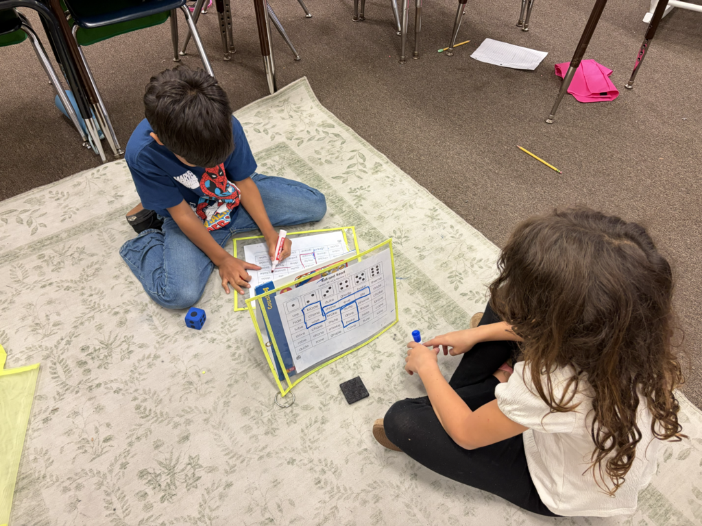 two students doing a learning activity in small group