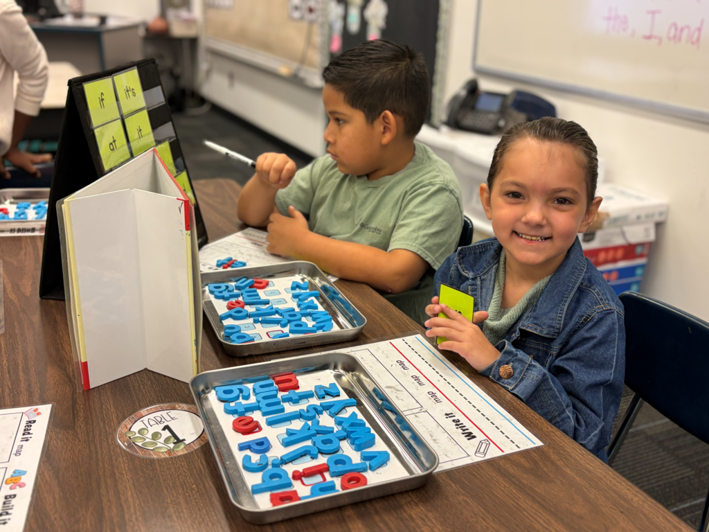 two students doing a learning activity in small group