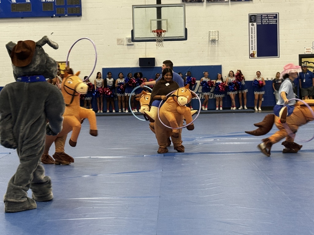 students at pep rally playing a game