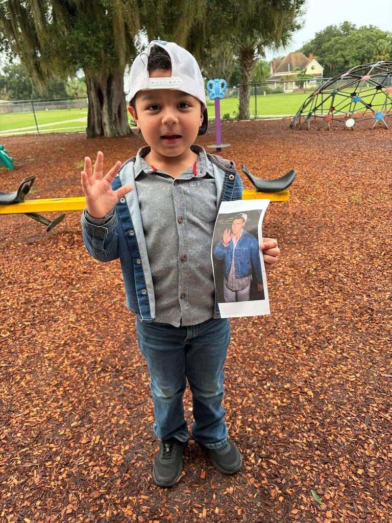boy dressed as Adam Sandler on the playground