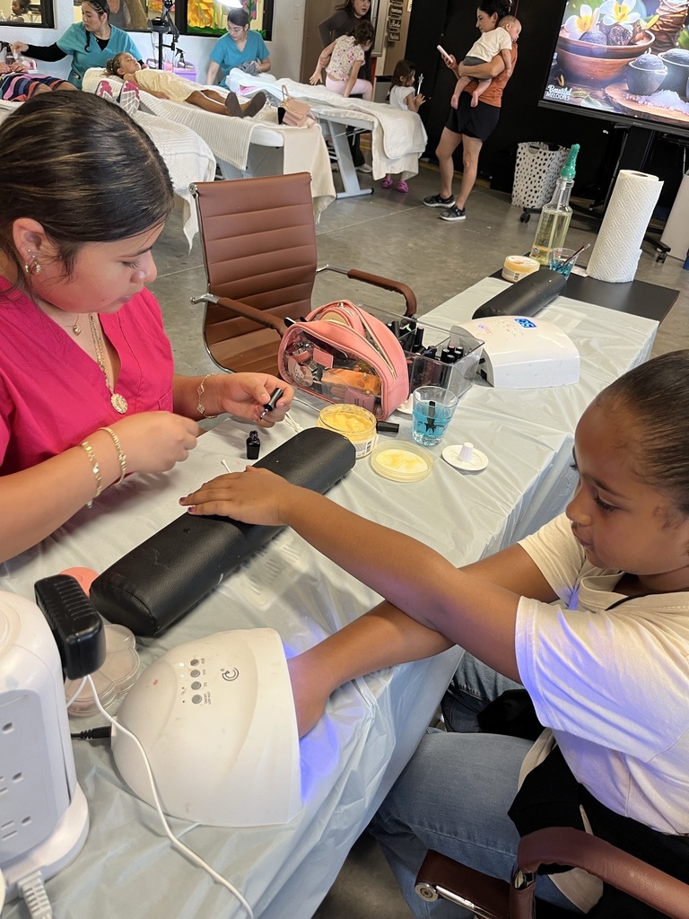 young girl getting her nails done