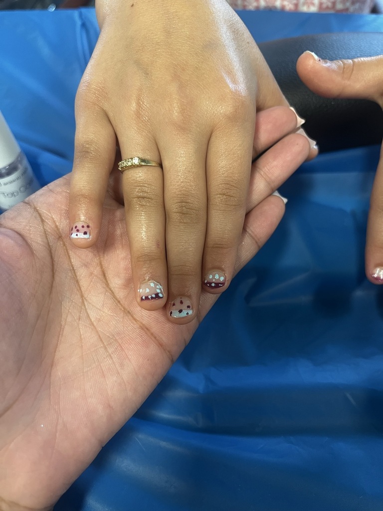 photo of young girl with nail art