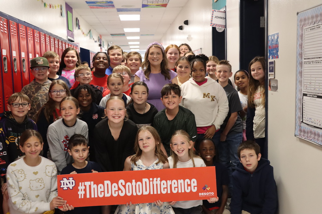 students celebrating teacher