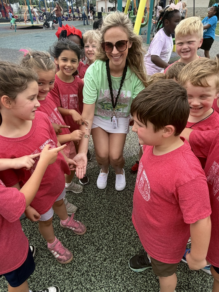 teacher and students on a field trip