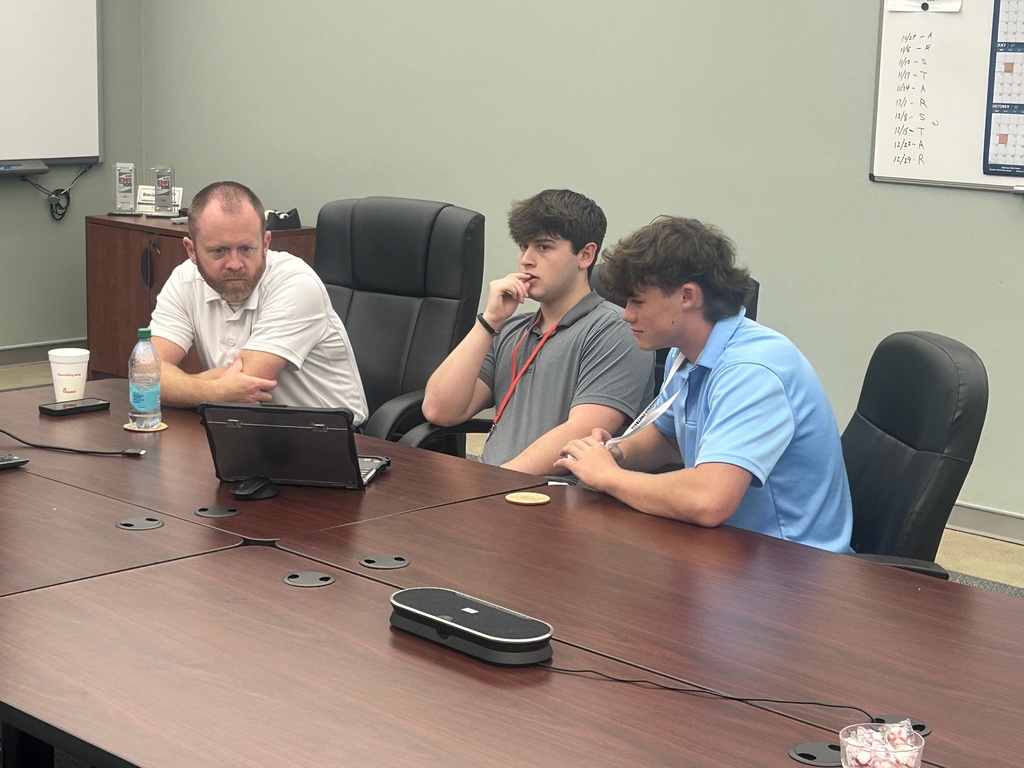 Engineering students discussing projects