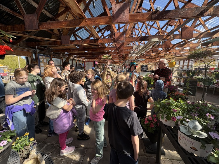 students learning at the greenhouse