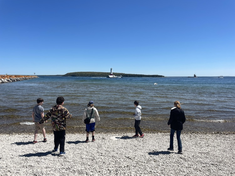 students enjoying the beach