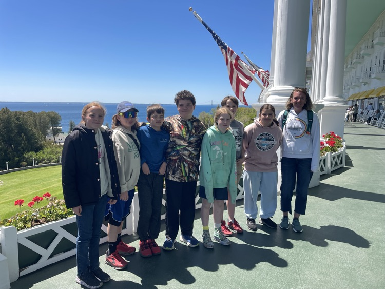 on the porch of the grand
