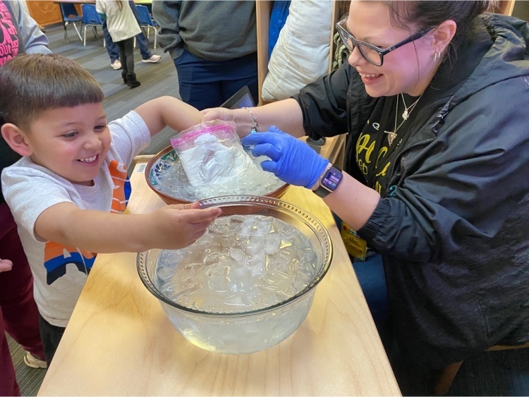student participating in blubber experiment