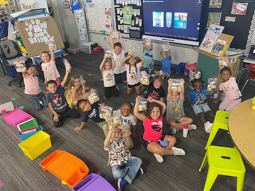 students in K makeing friendship salad