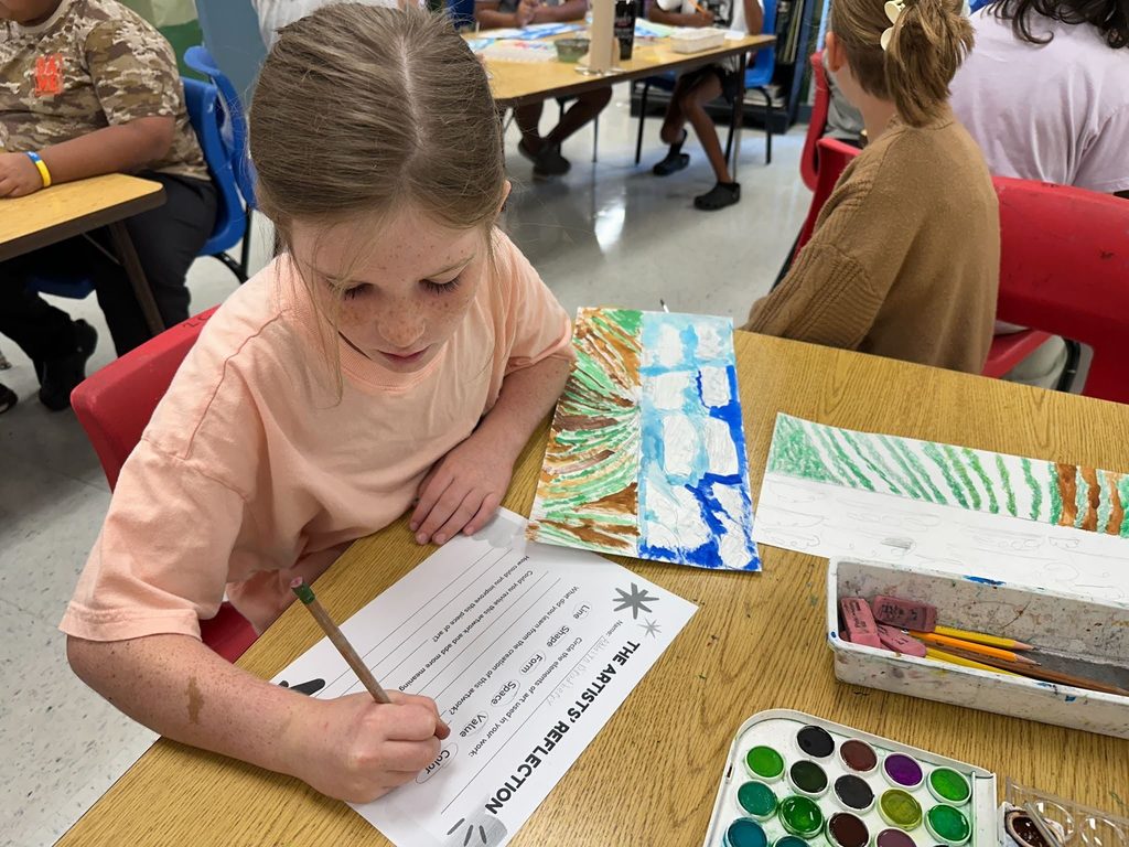 Student drawing a landscape