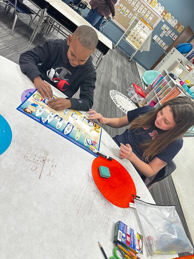 students using math manipulatives