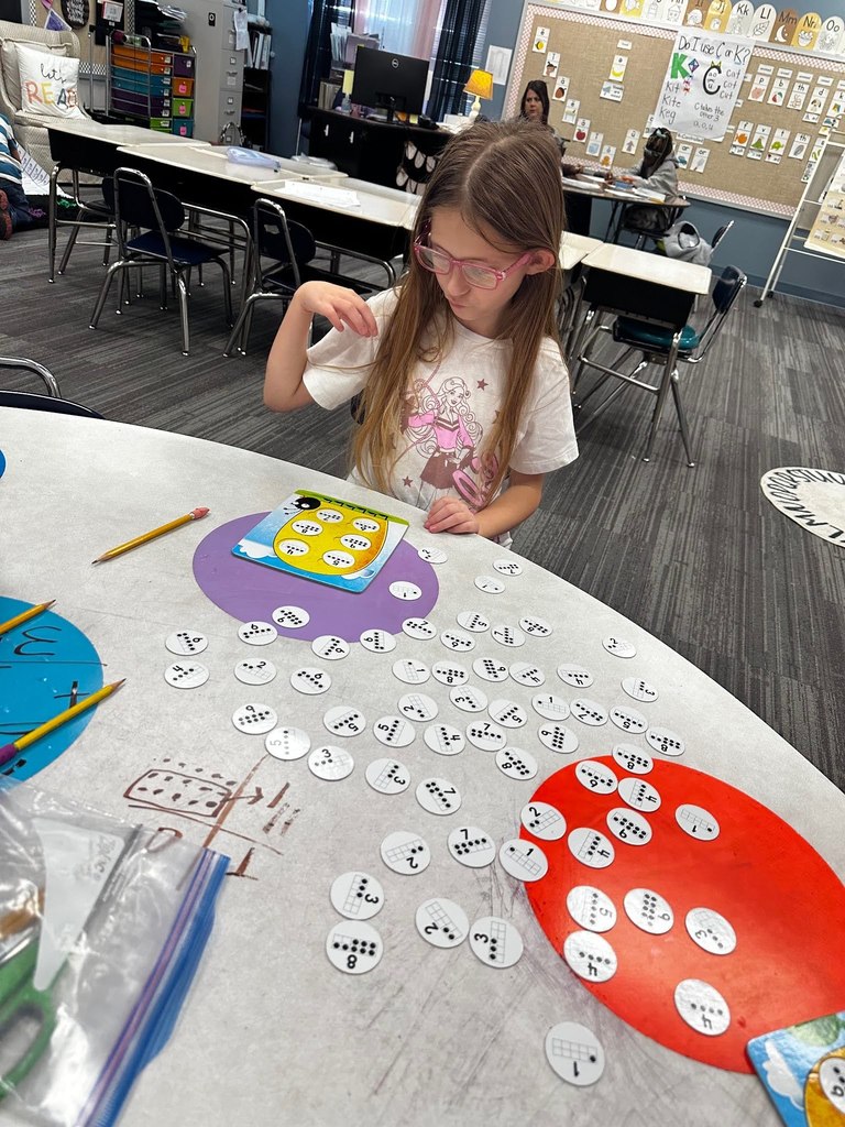 students using math manipulatives