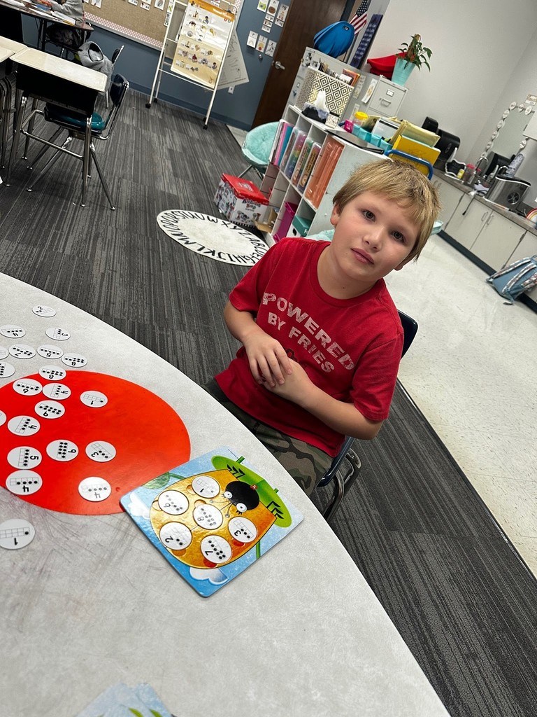 students using math manipulatives