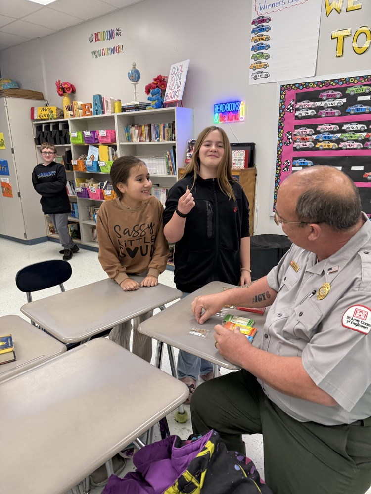students eating mealworms and crickets