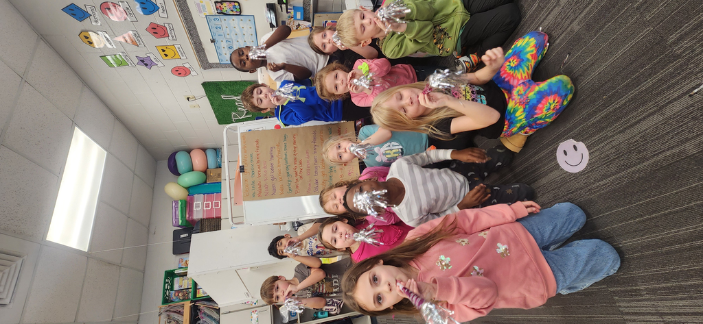 Students blowing new years horns