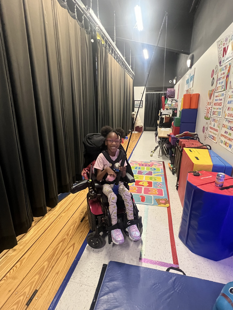 student with adapted fishing pole