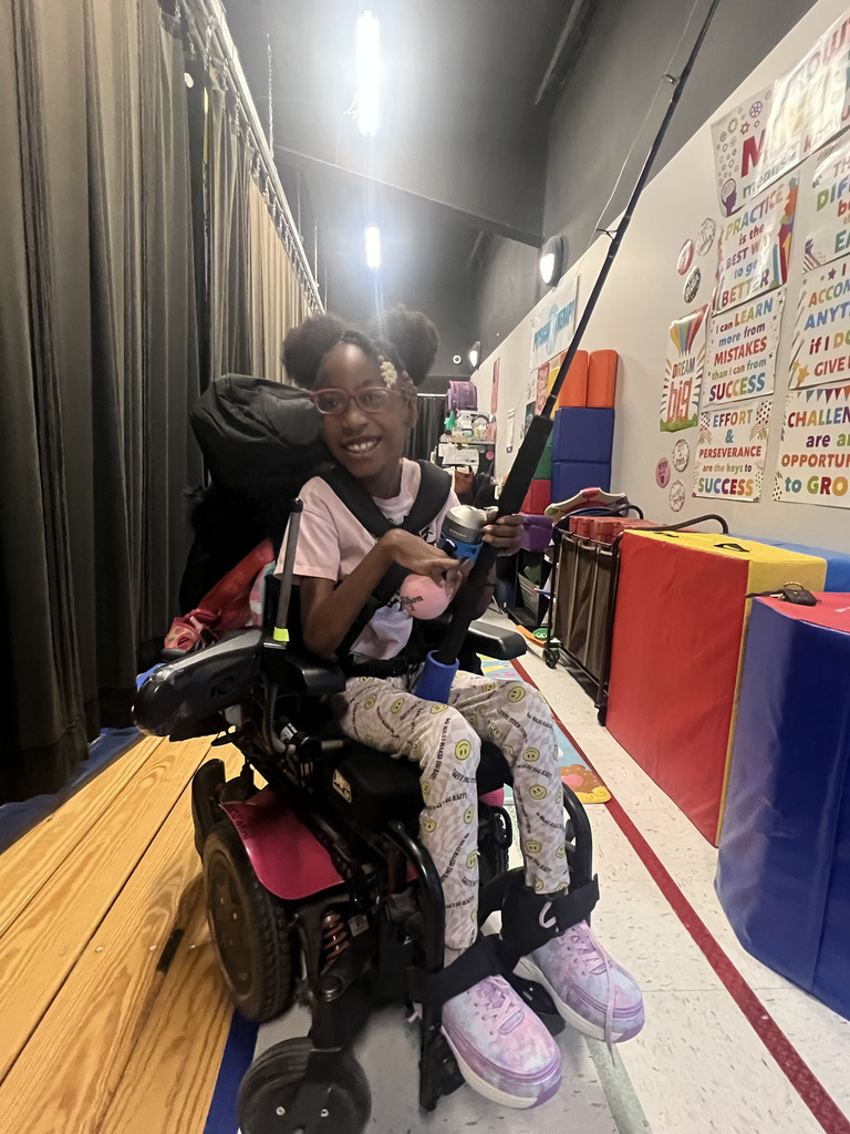 student with adapted fishing pole