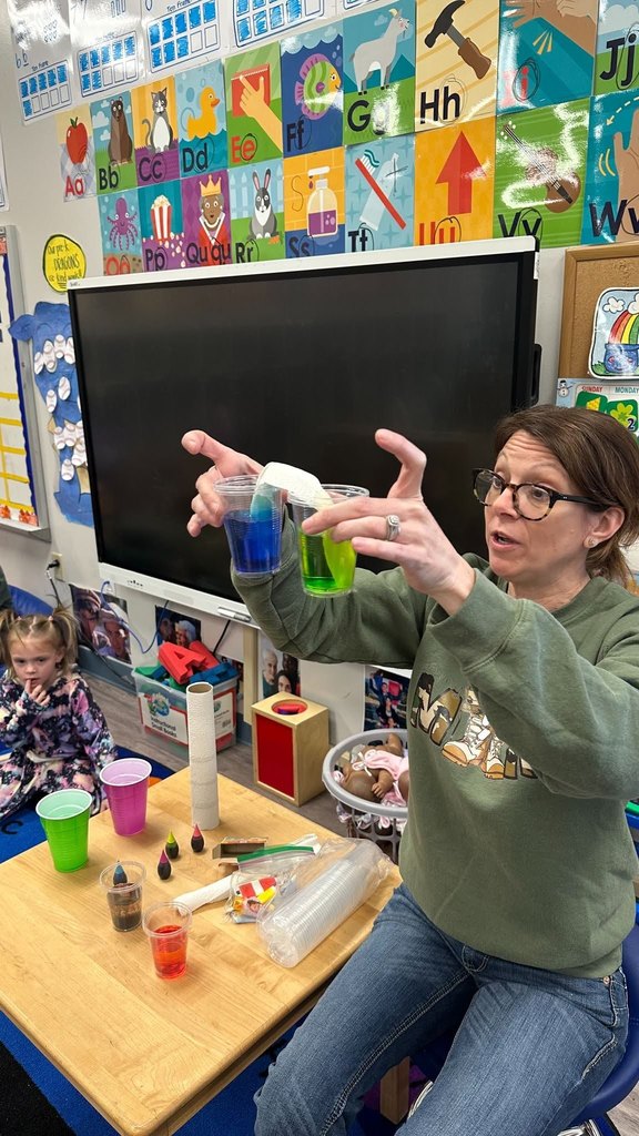 Mrs Wendy leading a science experiment with Pre-K Students