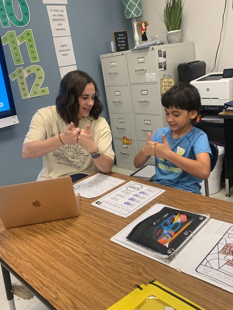 students working with occupational therapist