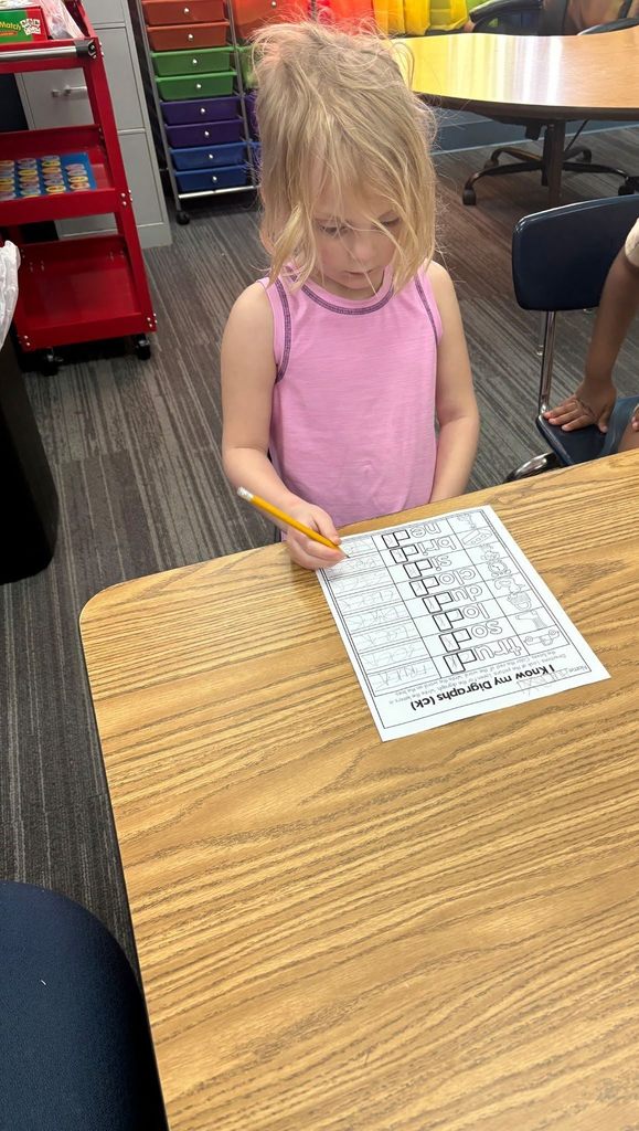 student completing. a worksheet