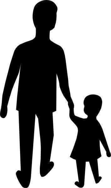 silhouette of parent walking child