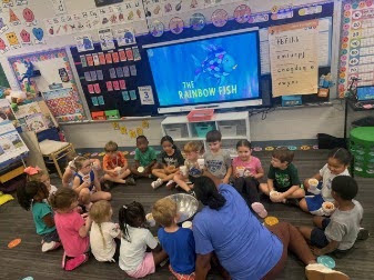 Ms Leslies class making a kindness salad