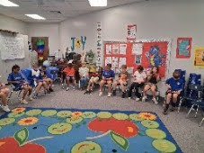 students singing in music