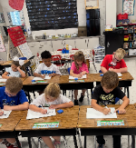 students working in Mrs. Joanna's class