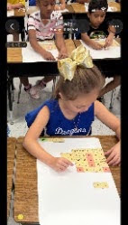 students working in Mrs. Joanna's class