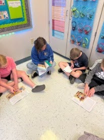 5th grade literacy students doing group work