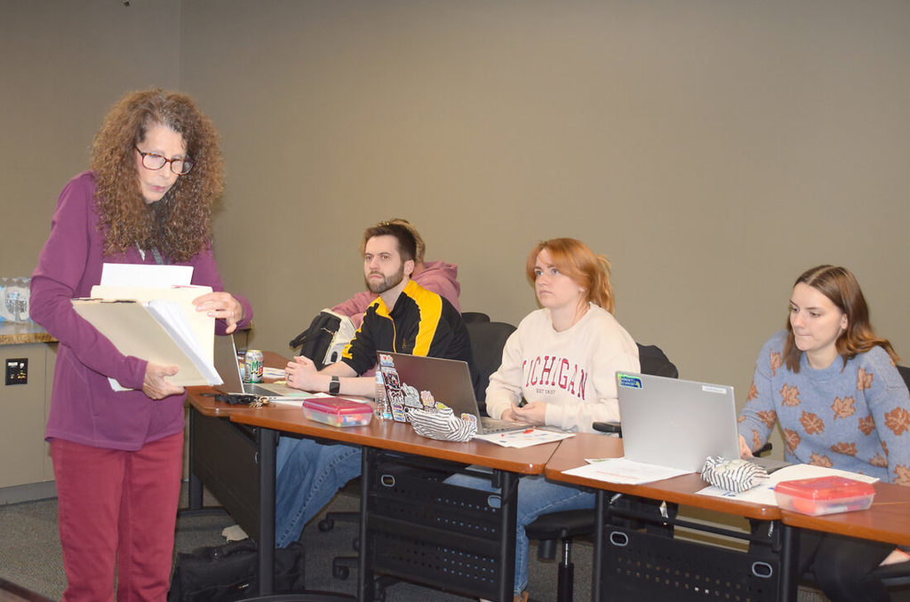 DIISD K-12 General Education Consultant Ginny Brouillard discusses topics with local English Teachers.