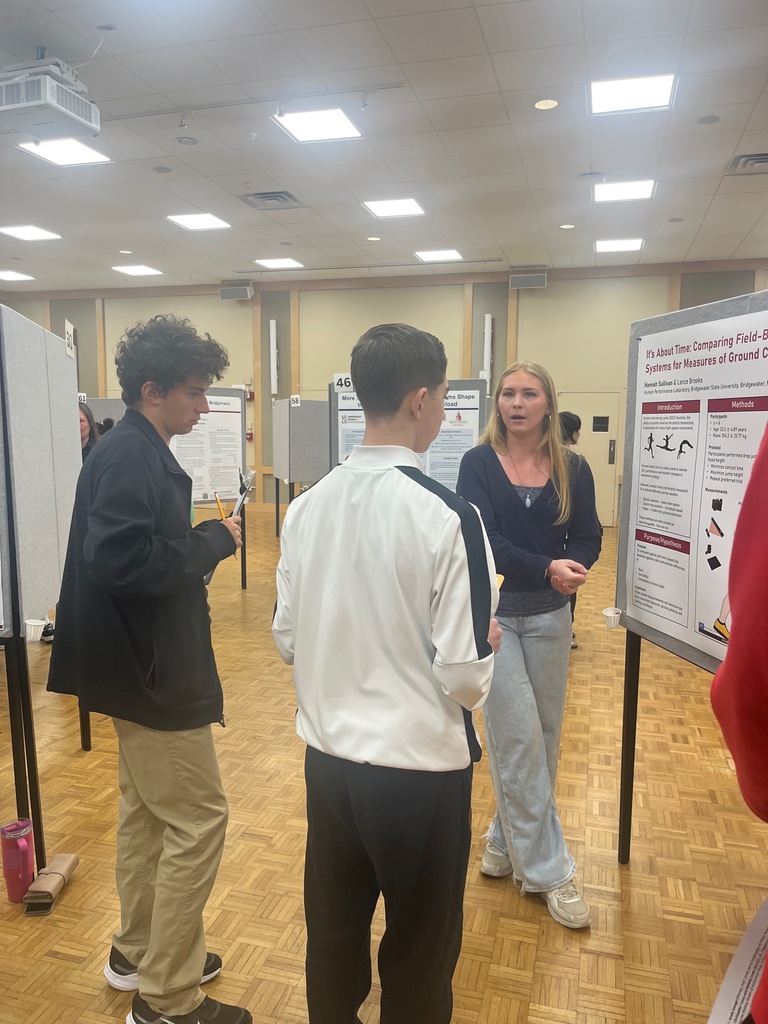 students listen to a presentation