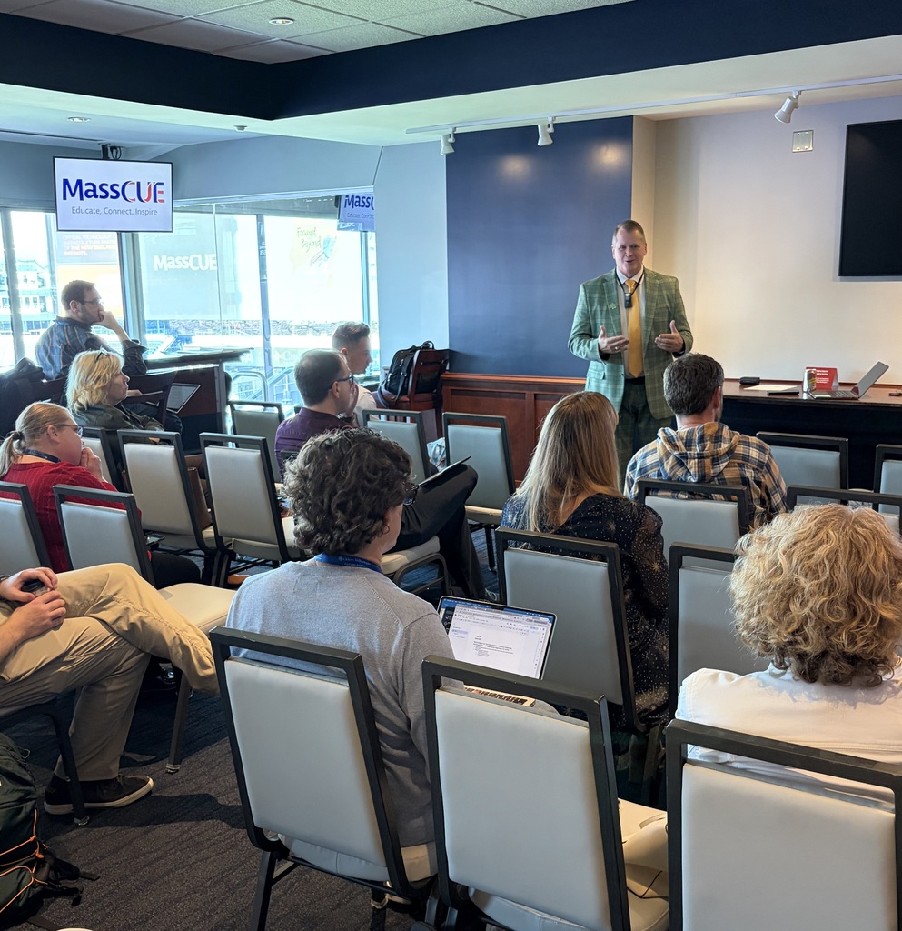 Superintendent Runey speaks to a small crowd at MassCUE