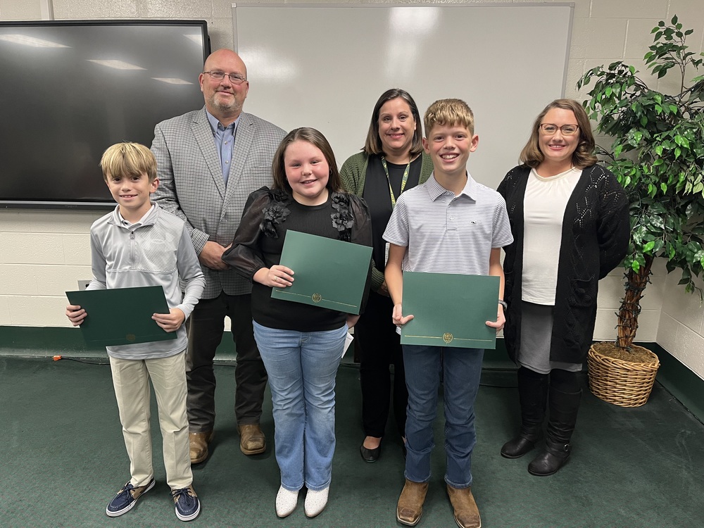 Kyle Berry, Emily Mew, & Sandy Jones pictured with student's earning a perfect score on SC Ready Assessment: Cooper Cook, Anna Herring, & Landon Gasque