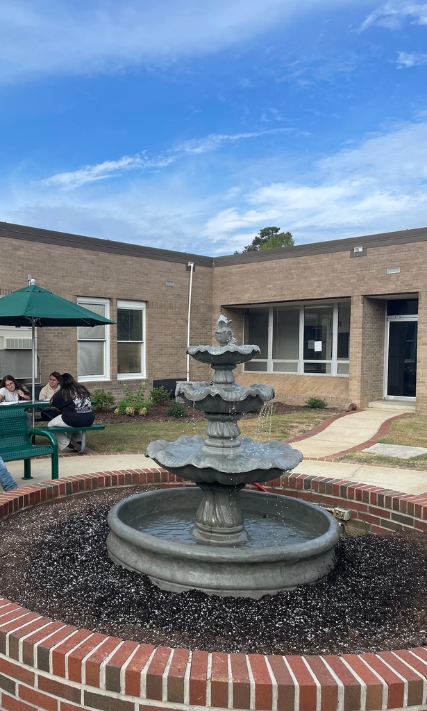 Students were enjoying the beautiful day by writing haikus by our newly renovated Courtyard!