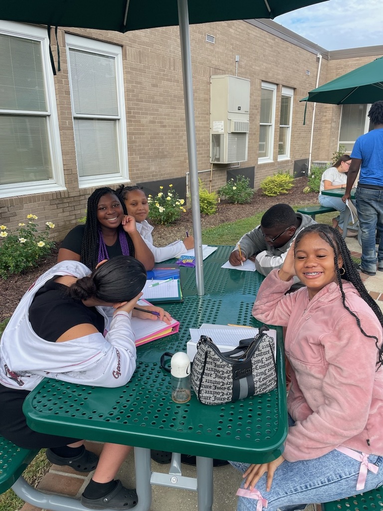 Students were enjoying the beautiful day by writing haikus by our newly renovated Courtyard!
