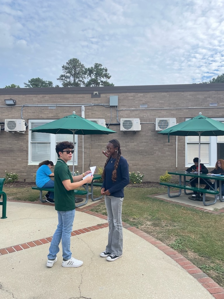 Students were enjoying the beautiful day by writing haikus by our newly renovated Courtyard!