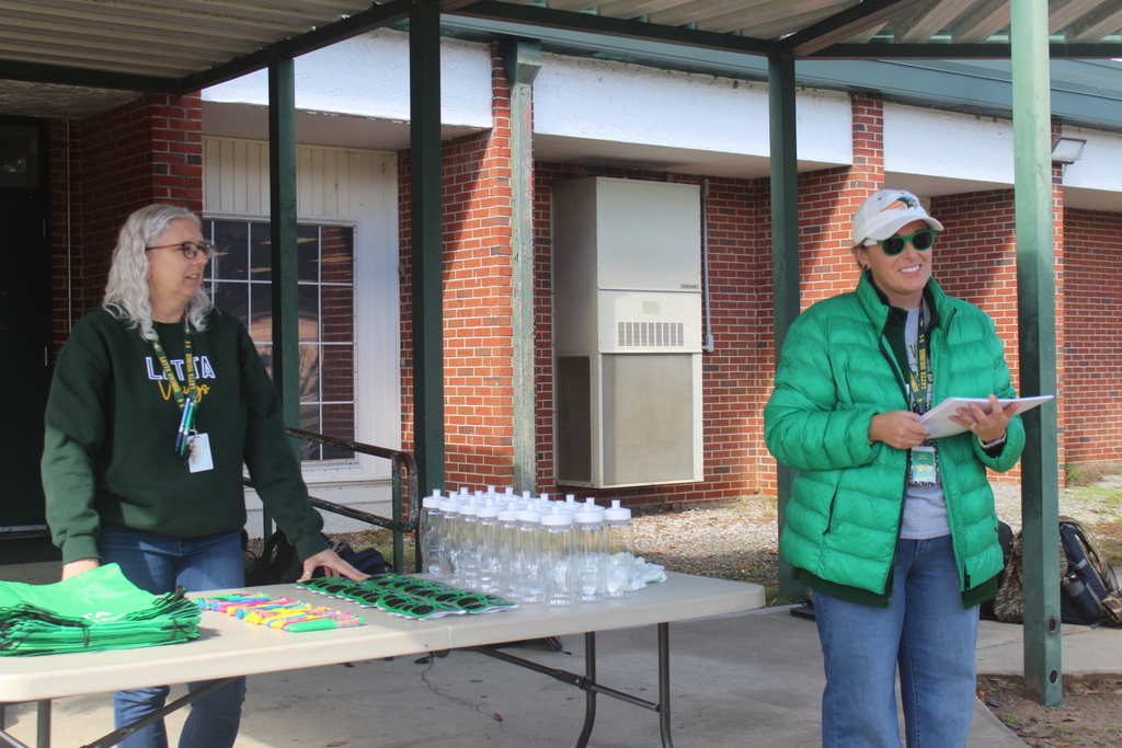 Staff hands out certificates