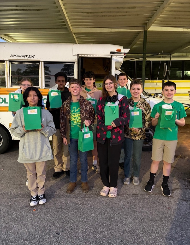 The LMS Academic Challenge team receives goody bags from Student Council as they head to the state competition.