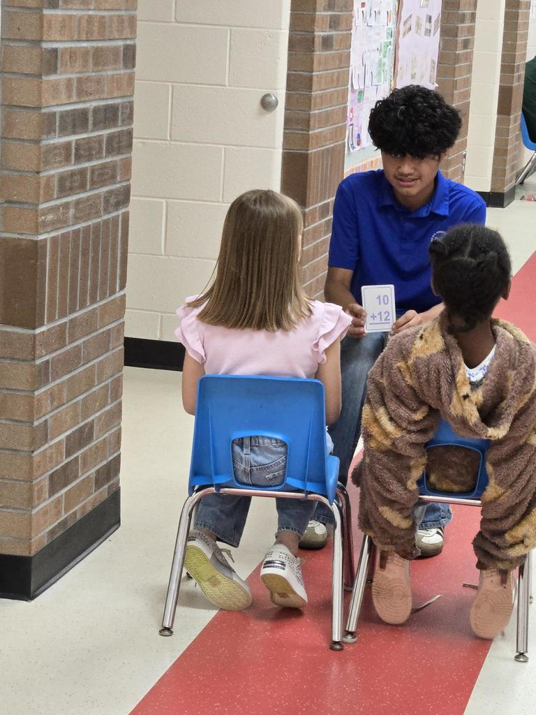 LMS ProTeam students assist in LES classrooms.