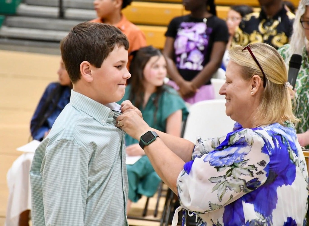 Students are inducted into the NJHS.